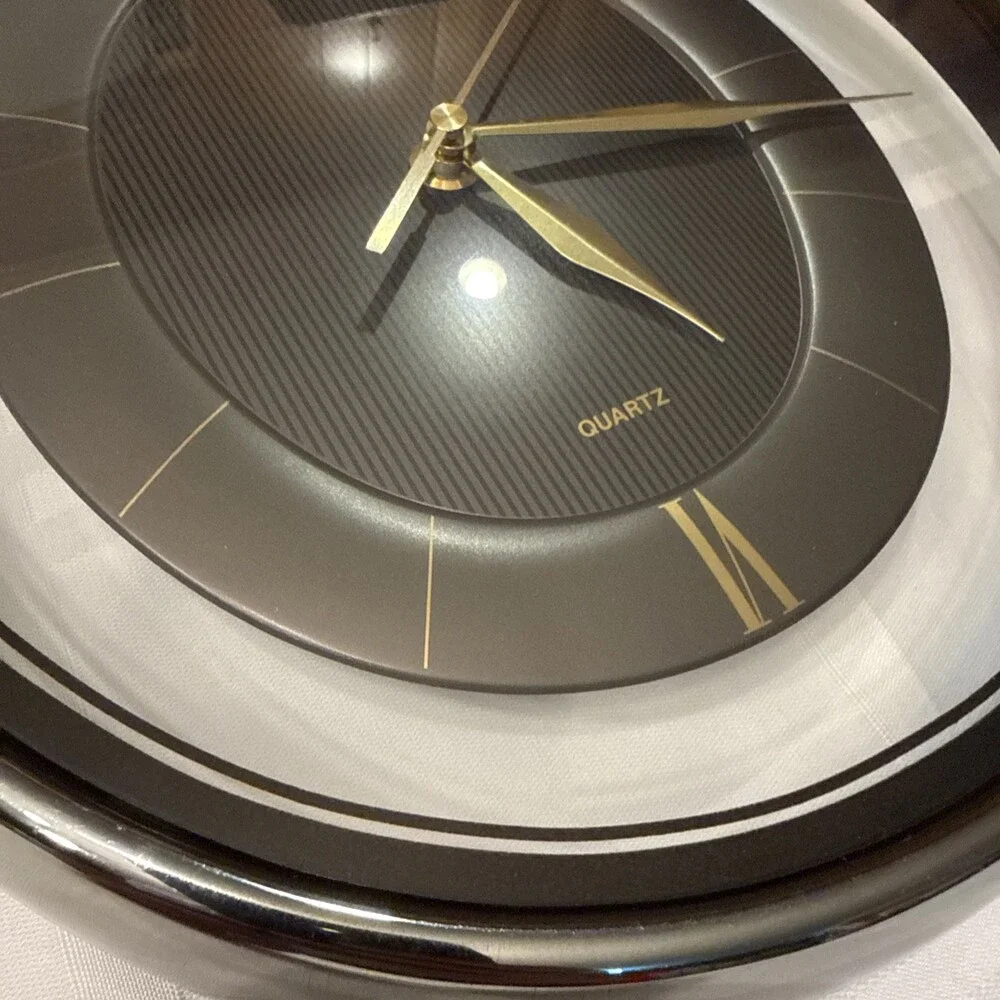 Vintage 1980s Heirloom Quartz Wall Clock Clear Lucite Floating Oval Black Gold